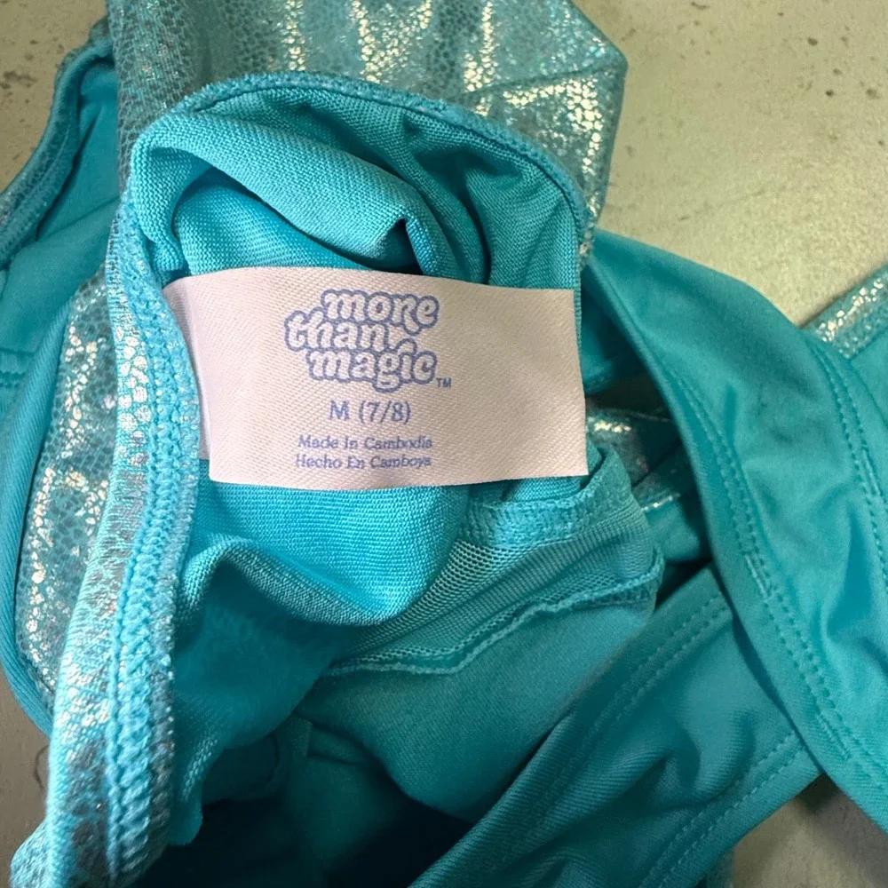 More Than Magic Girls Teal Shimmer Foil Gymnastics Leotard Crisscross Back M 7/8